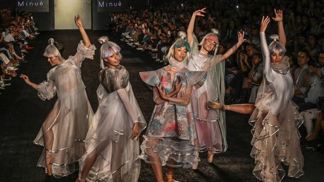 Models present creations by Fashion Design students from the Pontificia Bolivariana University (UPB)during Medellin Fashion Week in Medellin, Colombia. (Joaquin Sarmiento / AFP) Models present creations by Fashion Design students from the Pontificia Bolivariana University (UPB)during Medellin Fashion Week in Medellin, Colombia. (Joaquin Sarmiento / AFP)