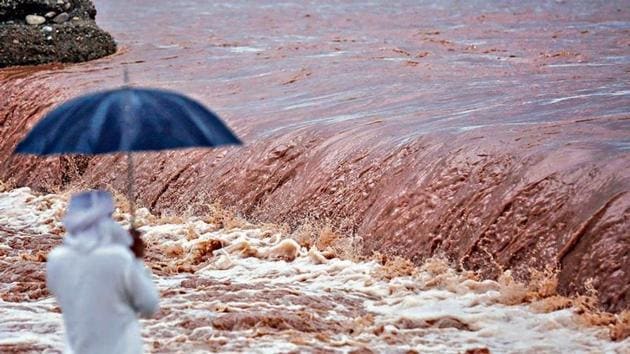 The flooded Tawi river as heavy rain lashes Jammu on Sunday.(PTI Photo) The flooded Tawi river as heavy rain lashes Jammu on Sunday.(PTI Photo)