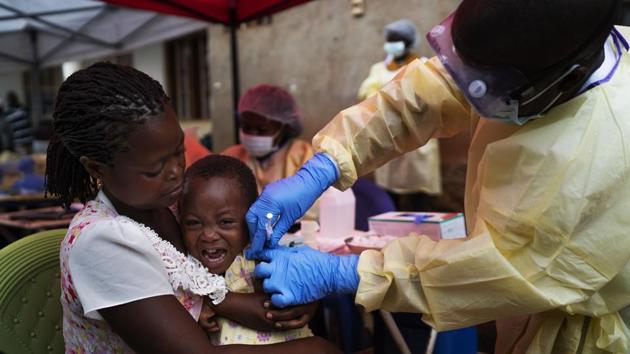 A child is vaccinated against Ebola in Beni, Congo. Health experts agree the experimental Ebola vaccine has saved multitudes in Congo. But after nearly a year and some 1,71,000 doses given, the epidemic shows few signs of waning. The virus has killed more than 1,700 people and has now arrived in the region’s largest city, Goma. The World Health Organisation recommended last week that the outbreak be declared a global health emergency. (Jerome Delay / AP) A child is vaccinated against Ebola in Beni, Congo. Health experts agree the experimental Ebola vaccine has saved multitudes in Congo. But after nearly a year and some 1,71,000 doses given, the epidemic shows few signs of waning. The virus has killed more than 1,700 people and has now arrived in the region’s largest city, Goma. The World Health Organisation recommended last week that the outbreak be declared a global health emergency. (Jerome Delay / AP)
