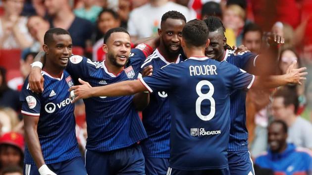 Olympique Lyonnais' Moussa Dembele celebrates scoring their second goal with team mates. (Reuters) Olympique Lyonnais' Moussa Dembele celebrates scoring their second goal with team mates. (Reuters)