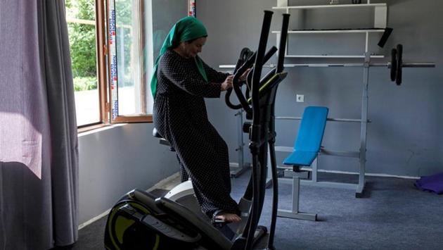 The Syrian war has directly affected at least one other woman in the valley, who has also faced prejudice in trying to raise a family alone. Sumaya’s husband was killed there. Now, she has opened a gym, which is one the few public places where women can meet. She says many are too fearful to attend. But Achishvili and her daughter Mariam, plan to go, hoping to show others that practicing sport is nothing to be ashamed of. (Ekaterina Anchevskaya / REUTERS)