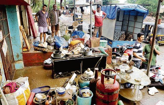 After Saturday’s deluge, residents Rameshwadi, Badlapur are struggling to get back to normalcy.(Rishikesh Choudhary/ Hindustan Times)