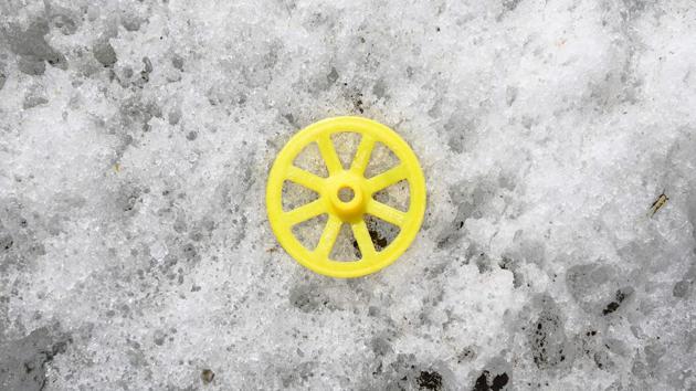 A plastic part of a ski stick found on the Mer de Glace glacier after the melting of ice. At one point, a sign on the edge of the valley says: “Level of the Glacier: 1990.” Now the ice has shrunk far below. (Marco Bertorello / AFP) A plastic part of a ski stick found on the Mer de Glace glacier after the melting of ice. At one point, a sign on the edge of the valley says: “Level of the Glacier: 1990.” Now the ice has shrunk far below. (Marco Bertorello / AFP)