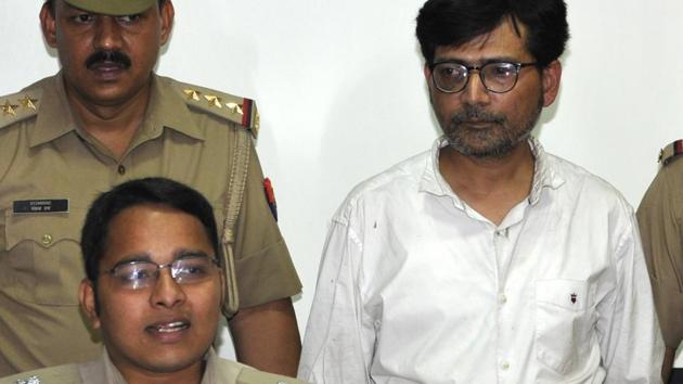 The suspect, Rajesh Khantwal, in police custody.(Sunil Ghosh / HT Photo) The suspect, Rajesh Khantwal, in police custody.(Sunil Ghosh / HT Photo)