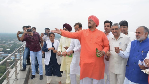 According to north civic body officials, the mayor rode a motorcycle to Haridwar on Saturday and returned with Ganga water on Monday night.(HT Photo) According to north civic body officials, the mayor rode a motorcycle to Haridwar on Saturday and returned with Ganga water on Monday night.(HT Photo)