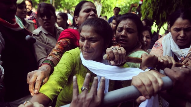 Congress Mahila Morcha members stagging protest in Lucknow demanding action against jailed BJP MLA and rape accused Kuldeep Singh Sengar.(Deepak Gupta/HT PHOTO)