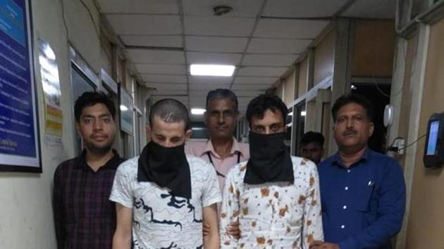 The two drug smugglers in NCB custody. (SOURCED) The two drug smugglers in NCB custody. (SOURCED)