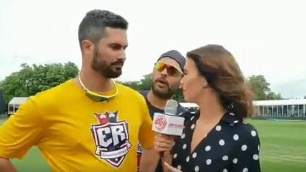 Yuvraj Singh crashes an interview featuring Ben Cutting and fiancee Erin Holland.(Twitter/Global T20 Canada)