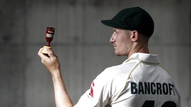 Cameron Bancroft of Australia poses with a replica Ashes Urn after the Australia Ashes Squad Announcement.(Getty Images)