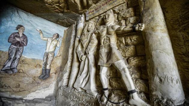 A sculpture depicting the torture of the Old Testament Biblical figure Samson at the hands of the Philistines according to the Book of Judges. The sculptures were made to fulfil the wishes of the monastery’s parish priest who met Mario in the early 1990s in Cairo. (Mohamed el-Shahed / AFP) A sculpture depicting the torture of the Old Testament Biblical figure Samson at the hands of the Philistines according to the Book of Judges. The sculptures were made to fulfil the wishes of the monastery’s parish priest who met Mario in the early 1990s in Cairo. (Mohamed el-Shahed / AFP)