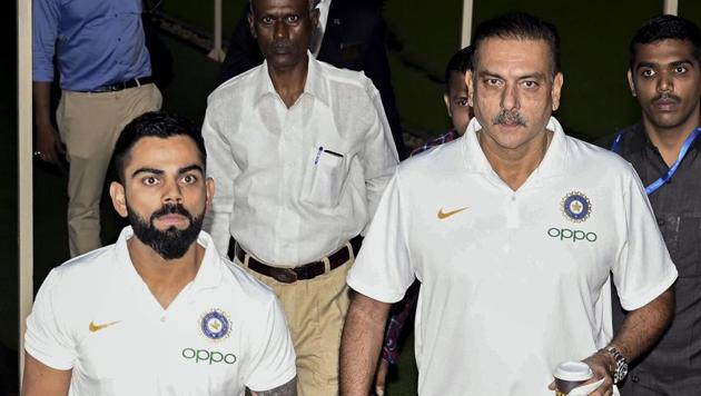 Mumbai: Indian cricket Captain Virat Kohli along with coach Ravi Shastri during a pre-departure press conference in Mumbai(PTI) Mumbai: Indian cricket Captain Virat Kohli along with coach Ravi Shastri during a pre-departure press conference in Mumbai(PTI)