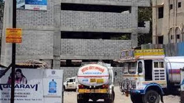 The petition alleged these water tankers are not registered with the Delhi Jal Board (DJB), the water utility in the city, and have been extracting groundwater without any consent. (HT FILE) The petition alleged these water tankers are not registered with the Delhi Jal Board (DJB), the water utility in the city, and have been extracting groundwater without any consent. (HT FILE)