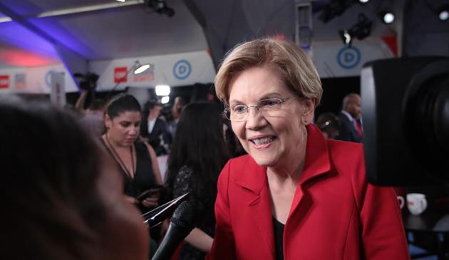 Democratic presidential candidate Sen. Elizabeth Warren (D-MA) speaks to the media in the spin room after the Democratic Presidential Debate July 30, 2019 in Detroit, Michigan.(AFP) Democratic presidential candidate Sen. Elizabeth Warren (D-MA) speaks to the media in the spin room after the Democratic Presidential Debate July 30, 2019 in Detroit, Michigan.(AFP)