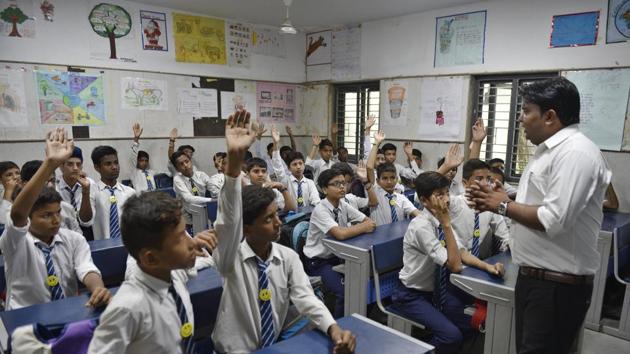Students listening to the teacher in the classroom during Happiness Class(Sanchit Khanna/HT PHOTO) Students listening to the teacher in the classroom during Happiness Class(Sanchit Khanna/HT PHOTO)