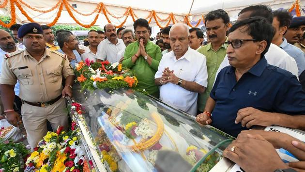 Karnataka Chief Minister B S Yediyurappa pays his respects to the mortal remains of VG Siddhartha, in Chikmagalur. His sudden disappearance and the letter by him alluding to pressures from a PE investor to buy back shares have left many questions unanswered. Coming from a family that has a 140-year history of growing coffee, Siddhartha initially dabbled in stock trading before actually setting his foot in the coffee business. (PTI) 