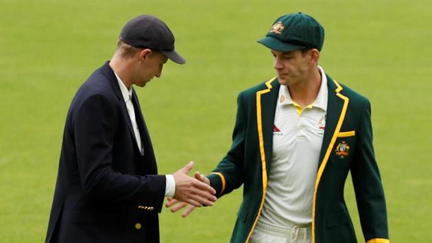 England's Joe Root and Australia's Tim Paine shake hands.(Action Images via Reuters)