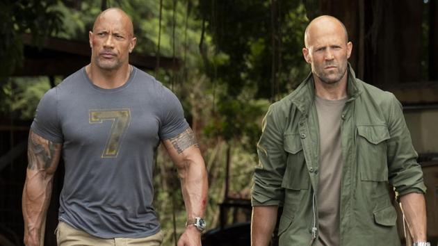 This image released by Universal Pictures shows Dwayne Johnson, left, and Jason Statham in a scene from Fast & Furious Presents: Hobbs & Shaw.(AP)