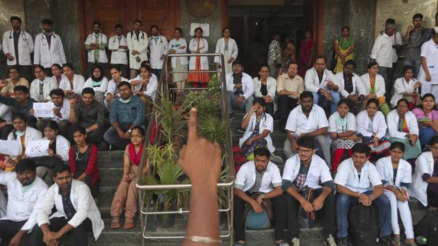 Doctors sit in protest at Government Gandhi Hospital in Hyderabad, Telangana on Wednesday. New Delhi’s AIIMS and Safdarjung in particular, receive thousands of patients from all over the country daily. “If the Bill gets passed in the Rajya Sabha, we will intensify our protests,” said Prakash Thakur of the RDA at Safdarjung Hospital. The IMA has termed the Bill “draconian” and “anti-people”. (Mahesh Kumar A. / AP) 
