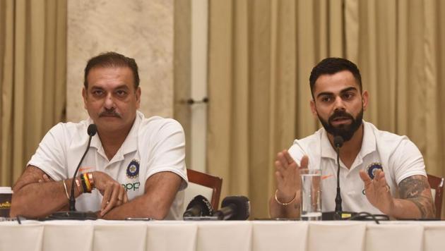 Indian Caption Virat Kohli and head coach Ravi Shastri during press conference before West Indies tour.(Satyabrata Tripathy/HT Photo)