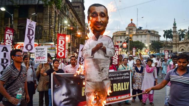 Student organisations burn an effigy of BJP MLA Kuldeep Singh Sengar, in Kolkata on July 31, 2019. The BJP on Thursday expelled the Uttar Pradesh MLA, who is an accused in the Unnao rape case and was on Wednesday booked by the CBI for alleged involvement in the survivor’s accident that left her with critical injuries. Sengar, 52, a four-time MLA, is accused of raping the woman in 2017. (Swapan Mahapatra / PTI) Student organisations burn an effigy of BJP MLA Kuldeep Singh Sengar, in Kolkata on July 31, 2019. The BJP on Thursday expelled the Uttar Pradesh MLA, who is an accused in the Unnao rape case and was on Wednesday booked by the CBI for alleged involvement in the survivor’s accident that left her with critical injuries. Sengar, 52, a four-time MLA, is accused of raping the woman in 2017. (Swapan Mahapatra / PTI)