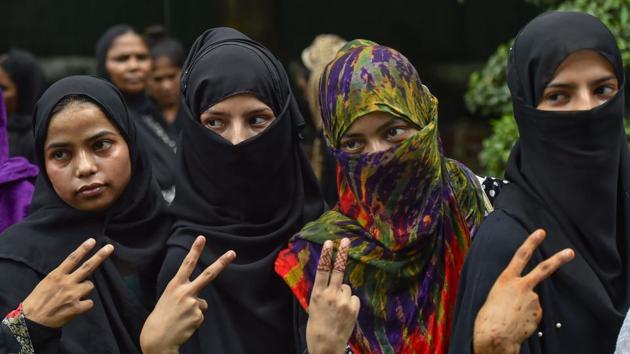 Muslim women celebrate the passage of Triple Talaq Bill in the Rajya Sabha on July 31.(HT/PHOTO)