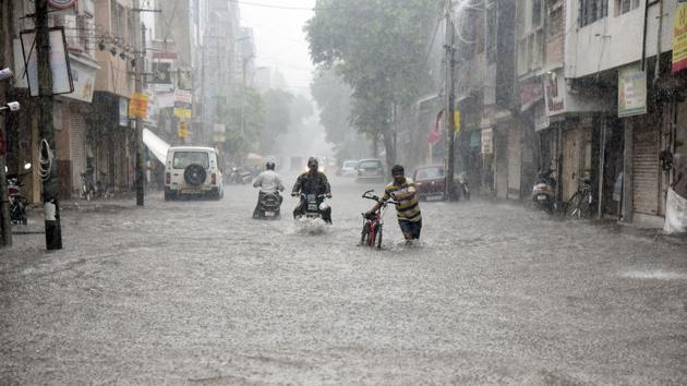 A view of the Siddharatha Bungalows on Sama-Savali Road, Vadodara. The city has been lashed by heavy rainfall leading to water-logging in many areas.(PTI Photo)