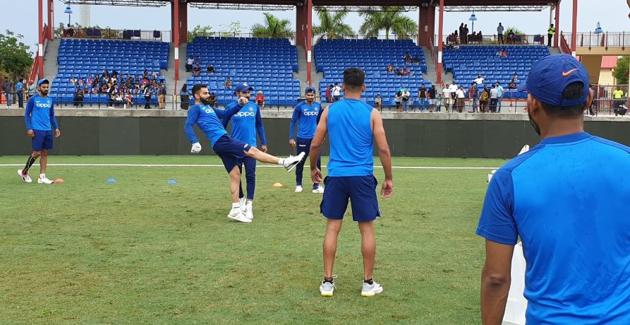 India skipper Virat Kohli kicks the ball as teammates look on during a training session in Florida. (BCCI/ Twitter) 