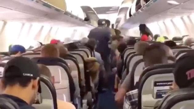 Passengers from Westjet plane deboards the plane in an orderly manner.(Twitter/@TomPodolec (Screengrab)) Passengers from Westjet plane deboards the plane in an orderly manner.(Twitter/@TomPodolec (Screengrab))