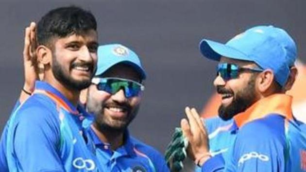 File image: India bowler Khaleel Ahmed (C) celebrates with captain Virat Kohli (R), Rohit Sharma and after taking a wicket. (AFP)