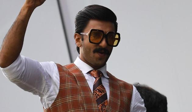 Ranveer Singh poses as he watches a match between India and Pakistan at Old Trafford in Manchester, northwest England during the 2019 Cricket World Cup.(AFP)