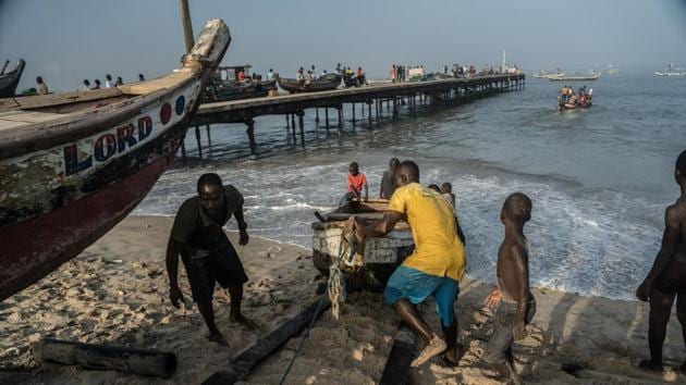 Fishermen come ashore at Jamestown Pier, a landmark for the fishing community. Few know the threats better than Nii Quaye, a former fisherman who now works as a spokesman for the local trade and checks catches coming in to ensure they have not been caught illegally. “When you arrest a person using chemicals or illegal fishing if they go to jail maybe for 3 to 6 months, when they arrest five people I think everything will be stopped,” he said. (Natalija Gormalova / AFP)