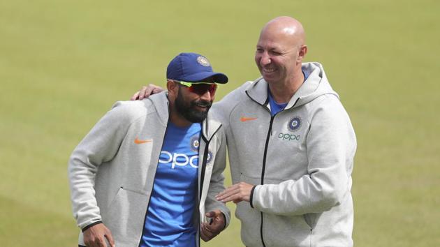 India's Mohammed Shami, left, shares a light moment with team physiotherapist Patrick Farhart (AP) India's Mohammed Shami, left, shares a light moment with team physiotherapist Patrick Farhart (AP)