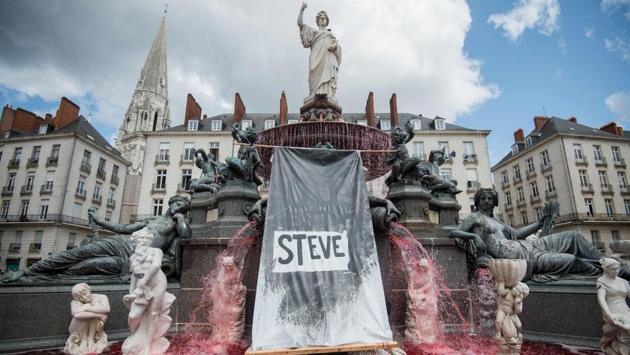 A red dye had been displayed in the fountain of the Place Royale in the western French city of Nantes, a day after the body of Steve Maia Canico, a 24-year-old French man who disappeared a month ago after falling in the river following a police operation during a music festival, had been found in the Loire river. (Loic Venance / AFP) A red dye had been displayed in the fountain of the Place Royale in the western French city of Nantes, a day after the body of Steve Maia Canico, a 24-year-old French man who disappeared a month ago after falling in the river following a police operation during a music festival, had been found in the Loire river. (Loic Venance / AFP)