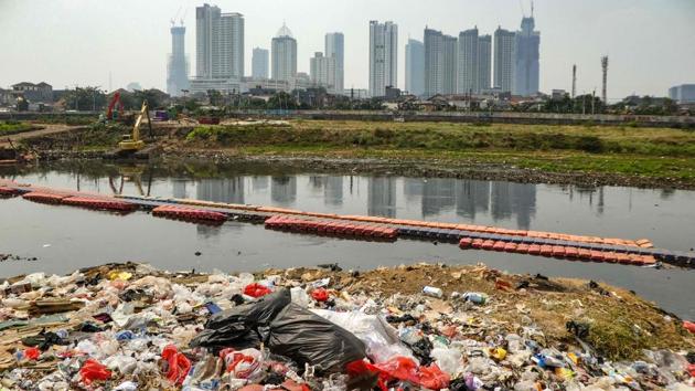 Plastic waste is pictured along a river bank in Jakarta, Indonesia. Global concern over plastic pollution has been spurred by shocking images of waste-clogged rivers in South-East Asia and accounts of dead sea creatures found with kilos of refuse in their stomachs. (Bay Ismoyo / AFP) Plastic waste is pictured along a river bank in Jakarta, Indonesia. Global concern over plastic pollution has been spurred by shocking images of waste-clogged rivers in South-East Asia and accounts of dead sea creatures found with kilos of refuse in their stomachs. (Bay Ismoyo / AFP)