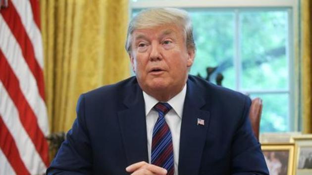 President Donald Trump resisted giving Beijing advance notice of his intent to slap a new 10% tariff on $300 billion in Chinese goods in an Oval Office meeting before he announced the duties.(REUTERS Photo)