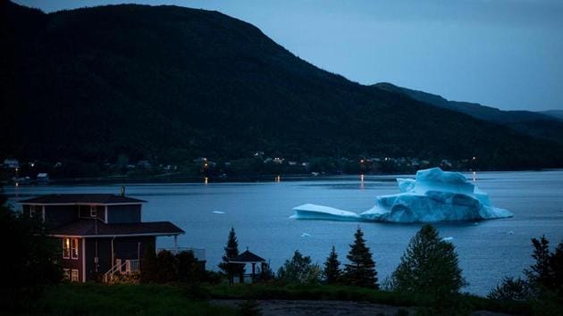 An icebergs swim at the seashore of King's Point on July 4, 2019 in Newfoundland, Canada. Formerly the center of cod fishing, the island province now sees more and more Icebergs that made their last trip from Greenland to Newfoundland.(Photo: AFP)