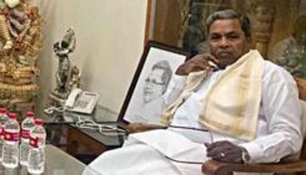 Siddaramaiah pointed out that there are no ministers for revenue, agriculture and rural development departments, which have to deal with drought and floods.(ANI Photo) Siddaramaiah pointed out that there are no ministers for revenue, agriculture and rural development departments, which have to deal with drought and floods.(ANI Photo)