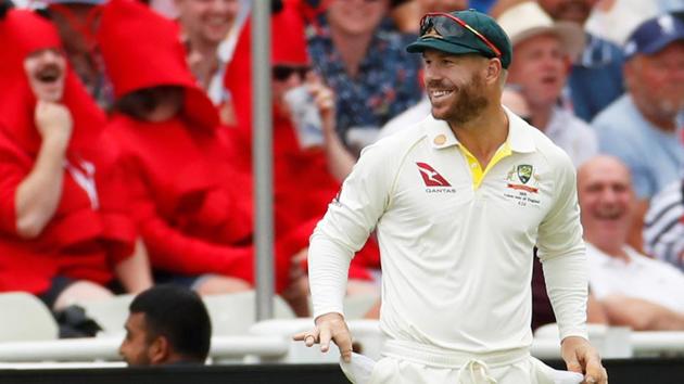 David Warner shows empty pockets to the crowd. (Reuters) David Warner shows empty pockets to the crowd. (Reuters)