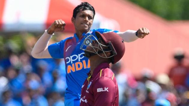 Shimron Hetmyer (R) of West Indies bowled by Navdeep Saini (L) of India. (AFP)