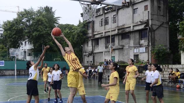 Match in progress between Bishop’s School, Kalyaninagar (yellow) and Deccan Gymkhana C during the 14th Late Indirabai Joshi Memorial under-18 Girikand Cup District Basketball Championship at Deccan Gymkhana basketball courts on Saturday. (Ravindra Joshi/HT PHOTO) Match in progress between Bishop’s School, Kalyaninagar (yellow) and Deccan Gymkhana C during the 14th Late Indirabai Joshi Memorial under-18 Girikand Cup District Basketball Championship at Deccan Gymkhana basketball courts on Saturday. (Ravindra Joshi/HT PHOTO)