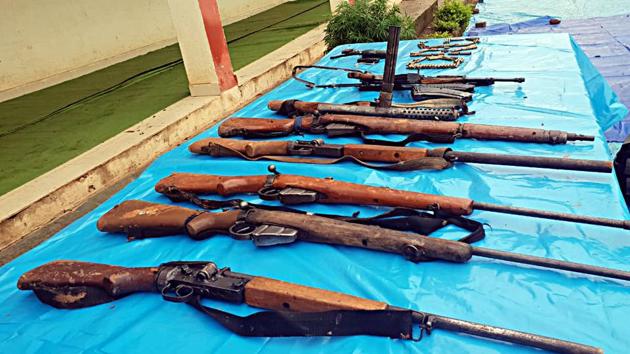 Arms recovered from Naxalite after seven Naxals, including five women, were killed in an encounter with the District Reserve Guard in the Sitagota jungle area of Rajnandgaon in Chhattisgarh on Saturday.(Photo: ANI)