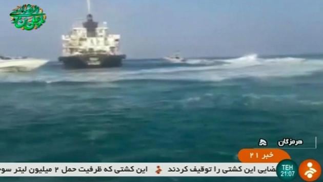 An image grab taken from a video released by the Iranian Revolutionary Guards on July 18, 2019, reportedly shows the Panamanian-flagged tanker Riah, that was detained by Iran's Revolutionary Guards, in the highly sensitive Strait of Hormuz. - Iran's Revolutionary Guards said they had detained a "foreign tanker" and its 12 crew for allegedly smuggling fuel, the latest incident in a tense standoff in the Gulf. The announcement comes two days after Iran said it had come to the aid of a foreign tanker after receiving a distress call -- making no mention of the vessel being seized. (AFP PHOTO / HO / IRIB) An image grab taken from a video released by the Iranian Revolutionary Guards on July 18, 2019, reportedly shows the Panamanian-flagged tanker Riah, that was detained by Iran's Revolutionary Guards, in the highly sensitive Strait of Hormuz. - Iran's Revolutionary Guards said they had detained a "foreign tanker" and its 12 crew for allegedly smuggling fuel, the latest incident in a tense standoff in the Gulf. The announcement comes two days after Iran said it had come to the aid of a foreign tanker after receiving a distress call -- making no mention of the vessel being seized. (AFP PHOTO / HO / IRIB)
