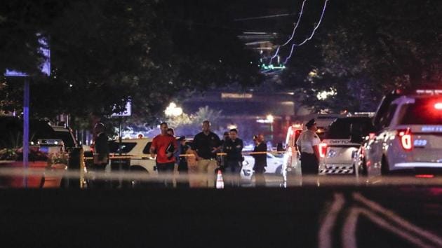 Authorities work the scene of a mass shooting, Sunday, Aug. 4, 2019, in Dayton, Ohio.(AP)