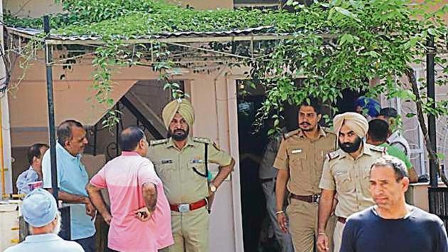 Police officials investigating the suicide and murder at the couple’s Sector 40 house in Chandigarh on Sunday. Police officials investigating the suicide and murder at the couple’s Sector 40 house in Chandigarh on Sunday.