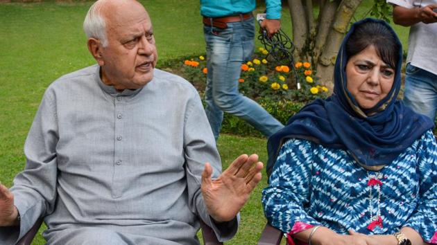 National Conference President Farooq Abdullah and former chief minister and PDP President?Mehbooba Mufti during an all parties meeting, in Srinagar, on Aug. 4, 2019.(PTI)