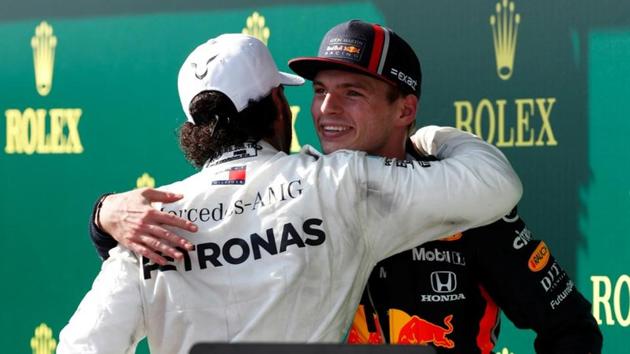 Mercedes' Lewis Hamilton and Red Bull's Max Verstappen embrace after finishing first and second in the Hungarian Grand Prix (REUTERS) Mercedes' Lewis Hamilton and Red Bull's Max Verstappen embrace after finishing first and second in the Hungarian Grand Prix (REUTERS)