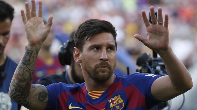 Barcelona forward Lionel Messi waves to the crowd prior of the Joan Gamper trophy.(AP)