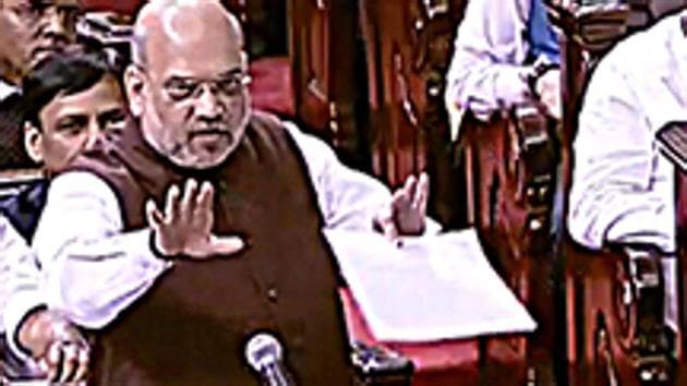New Delhi, August 05 (ANI Photo): Union Home Minister Amit Shah speaks during the debate over Jammu and Kashmir Reorganisation Bill at Rajya Sabha in New Delhi on Monday.(ANI Photo) New Delhi, August 05 (ANI Photo): Union Home Minister Amit Shah speaks during the debate over Jammu and Kashmir Reorganisation Bill at Rajya Sabha in New Delhi on Monday.(ANI Photo)