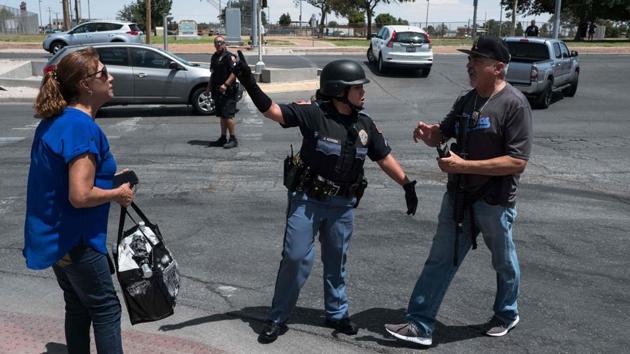 Law enforcement agencies respond to the shooter at a Walmart near Cielo Vista Mall. El Paso in West Texas, which has about 680,000 residents, sits across the border from Juarez, Mexico. The county is more than 80 percent Latino and Mexican citizens legally pass the border every day to work and shop in the US. (Joel Angel Juarez / AFP)