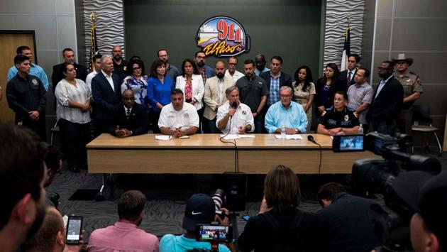 (L-R) El Paso Special Agent in Charge Emmerson Buie, Fire Chief Mario D’ Agostino, Texas Governor Greg Abbott, Mayor Dee Margo and Police Chief Greg Allen speak during a press briefing, following a mass fatal shooting, at the El Paso Regional Communications Center in El Paso. US President Donald Trump has said “perhaps more has to be done” to prevent mass shootings following the El Paso attack. (Joel Angel Juarez / AFP)